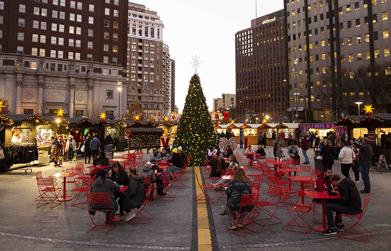 Circle of Rustic Board N Batten Custom Storage Shed Vendor Units Being Used At A Philadelphia Christmas Village