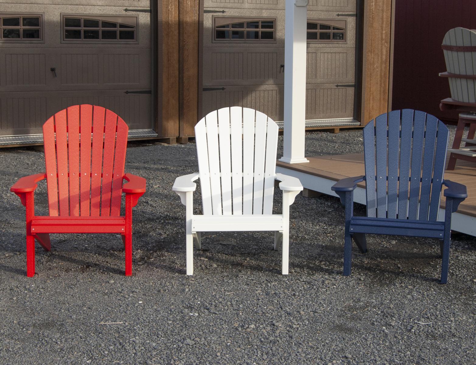 Red white and store blue adirondack chairs